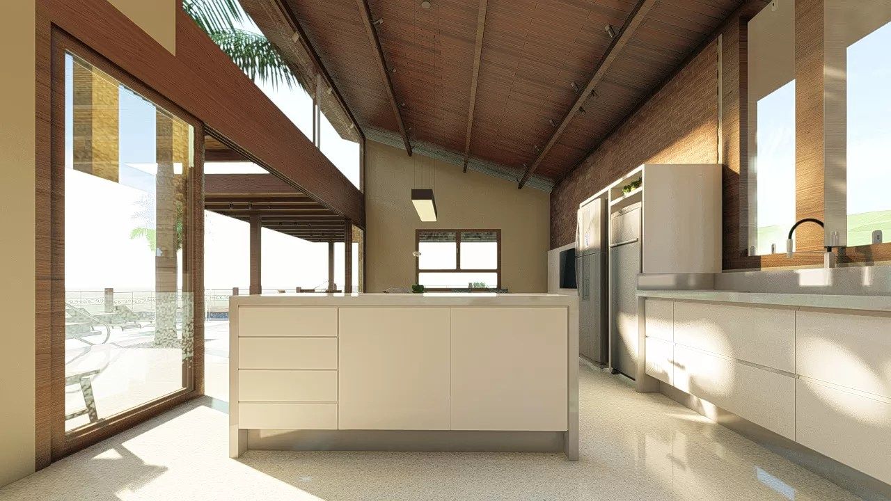 Cozinha com ilha central em marcenaria clara, coifa e portas de correr em vidro com vista para o deck e a piscina